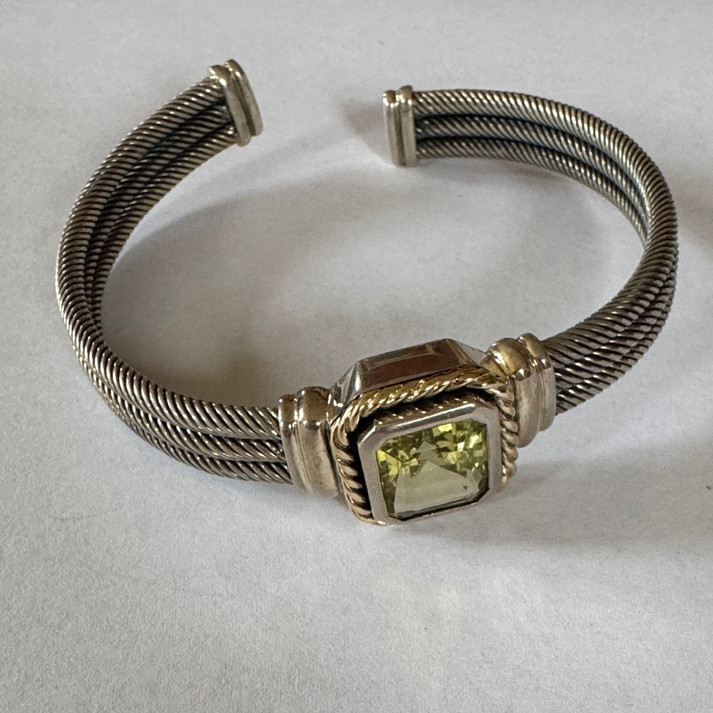 Elegant Silver and Gold Bracelet with Green Gemstone